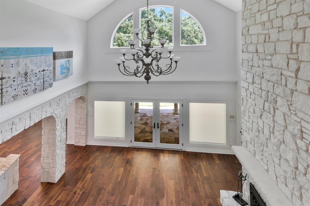 1980 Gertie Barrett Road Mansfield, TX 76063 - Photo 19 of 40 wooden floor in a hall with a window