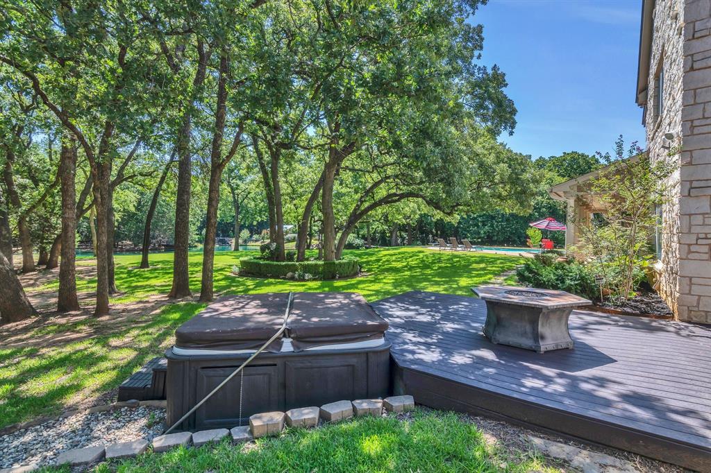 1980 Gertie Barrett Road Mansfield, TX 76063 - Photo 25 of 40 a view of a backyard with sitting area