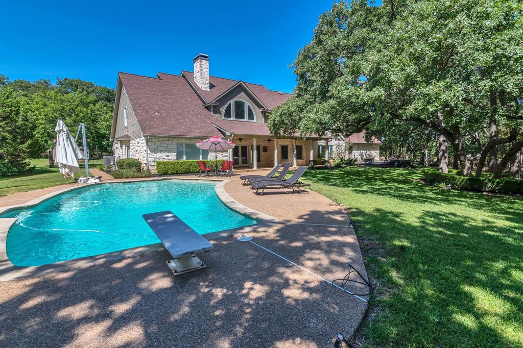 1980 Gertie Barrett Road Mansfield, TX 76063 - Photo 27 of 40 a front view of a house with garden