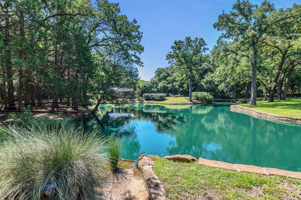 1980 Gertie Barrett Road Mansfield, TX 76063 - Photo 30 of 40 a view of a lake with houses in the background