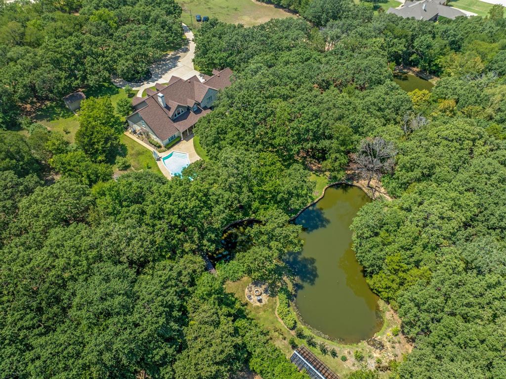 1980 Gertie Barrett Road Mansfield, TX 76063 - Photo 34 of 40 an aerial view of residential house with outdoor space and trees all around