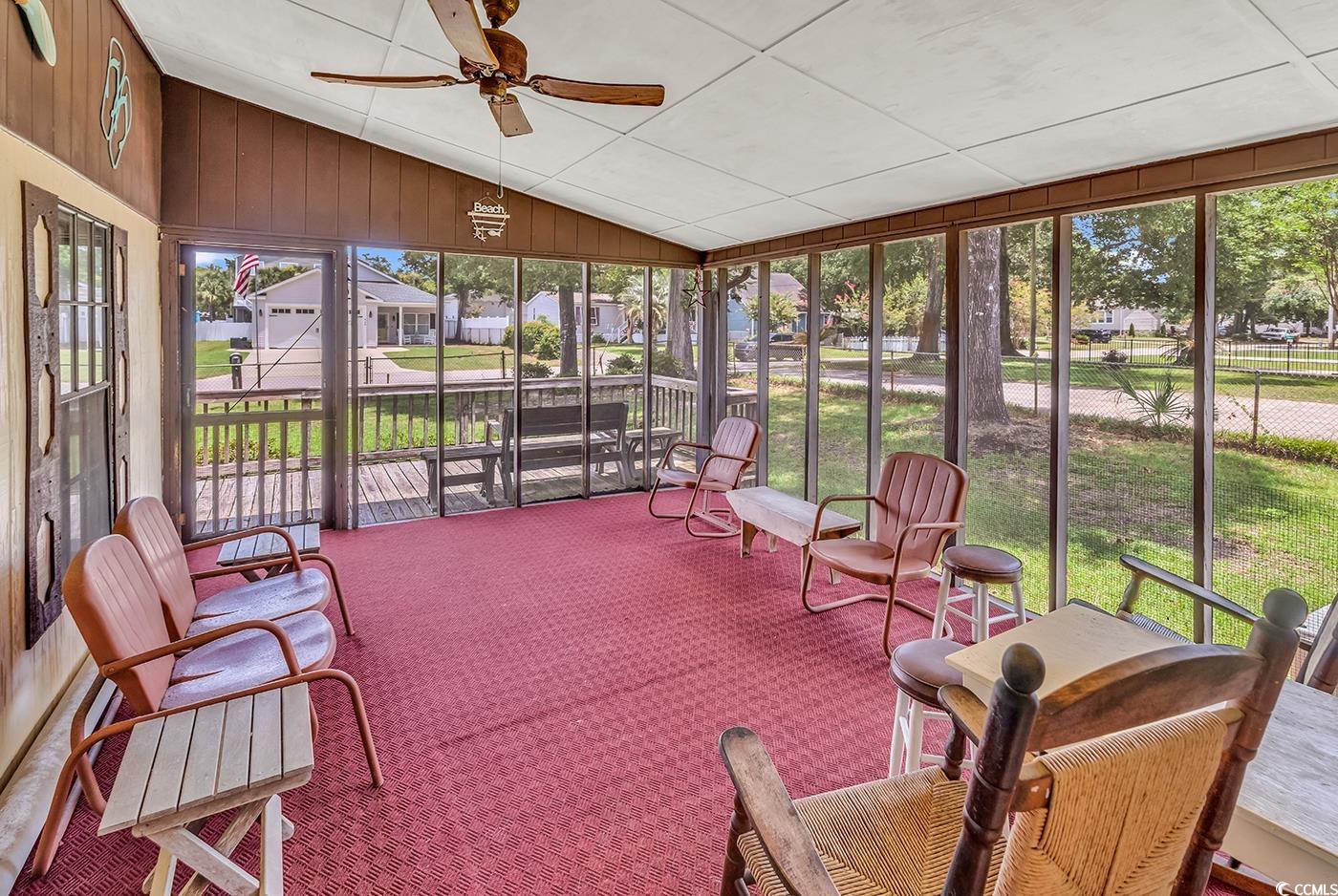 449 Rainbow Drive Murrells Inlet, SC 29576 - Photo 23 of 33 Sunroom with lofted ceiling and a ceiling fan
