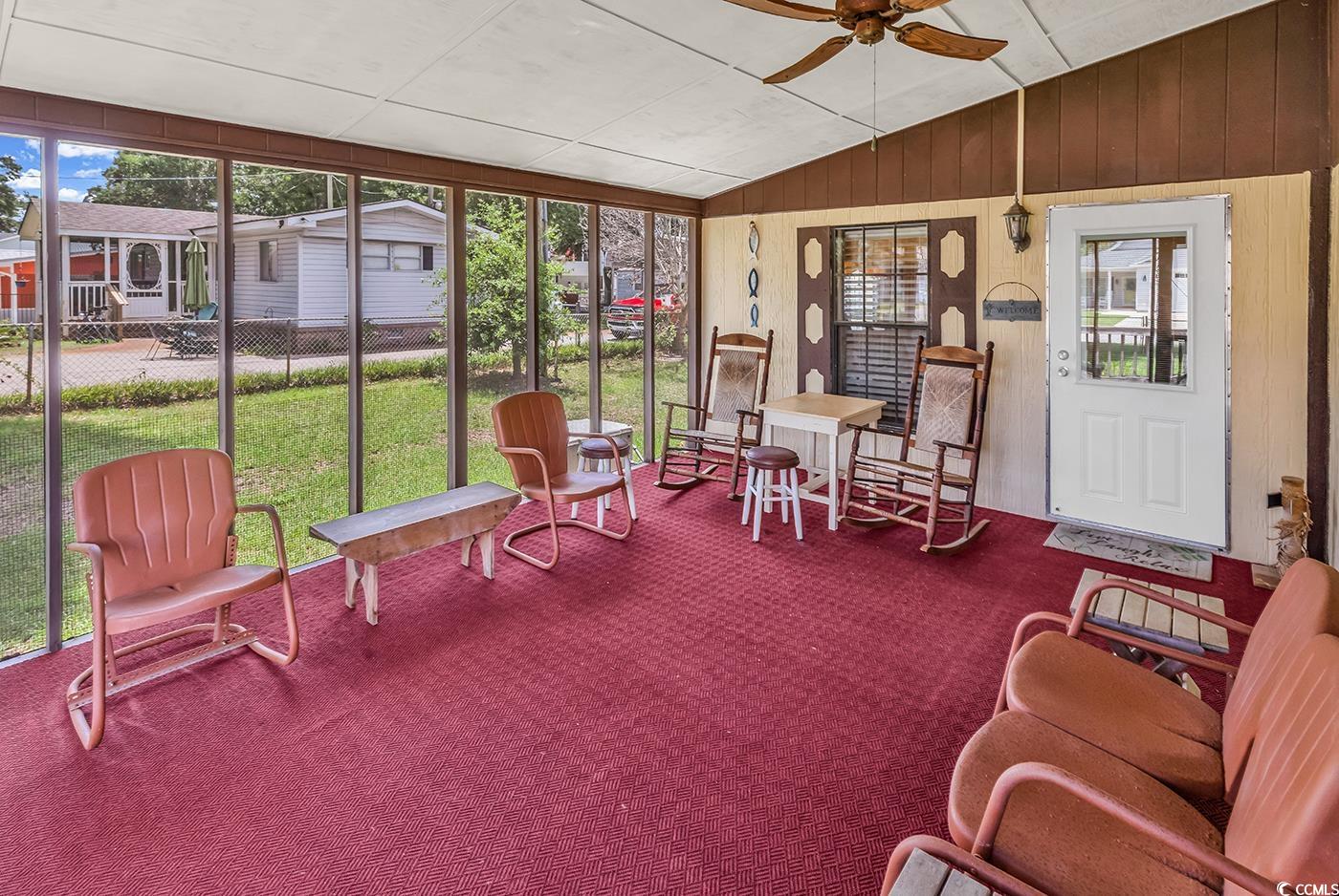 449 Rainbow Drive Murrells Inlet, SC 29576 - Photo 24 of 33 Sunroom / solarium with a ceiling fan and lofted ceiling