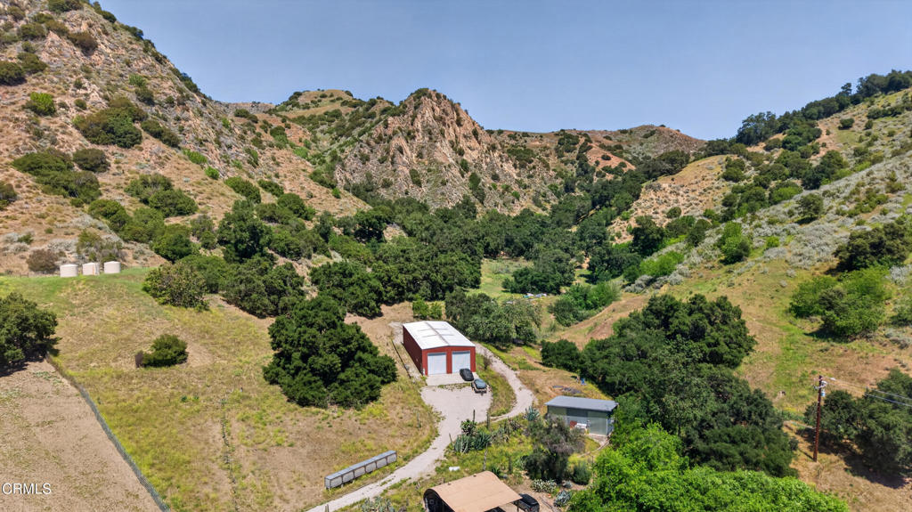 8416 Wheeler Canyon Road Santa Paula, CA 93060 - Photo 42 of 48 an aerial view of a house with a yard