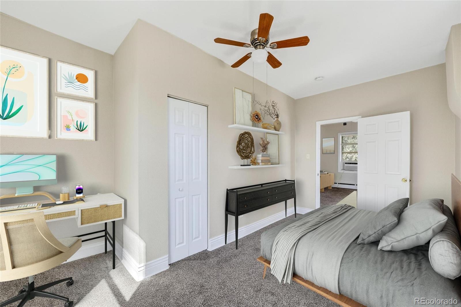 3127 West 28th Avenue, Unit 2 Denver, CO 80211 - Photo 28 of 30 a bedroom with a bed and a chandelier