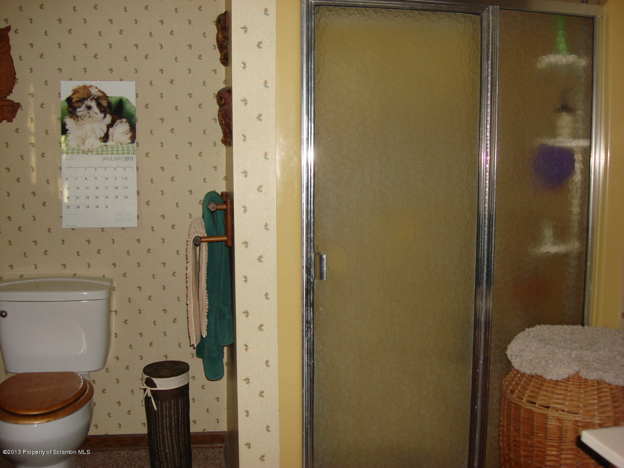 276 Lane Hill Road Tunkhannock, PA 18657 - Photo 11 of 13 a bathroom with a granite countertop toilet and a shower