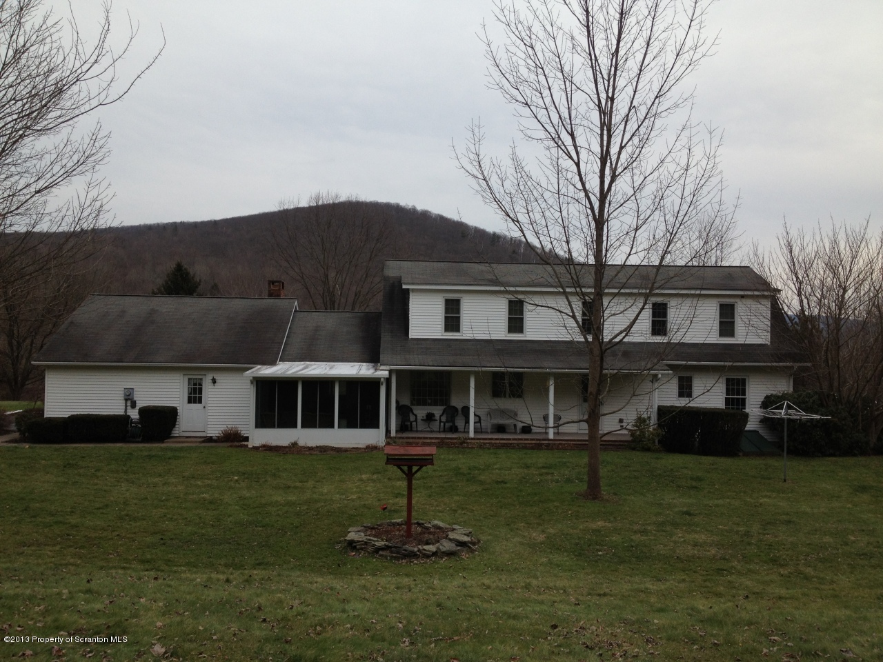 276 Lane Hill Road Tunkhannock, PA 18657 - Photo 12 of 13 a house that has a lots of trees in it