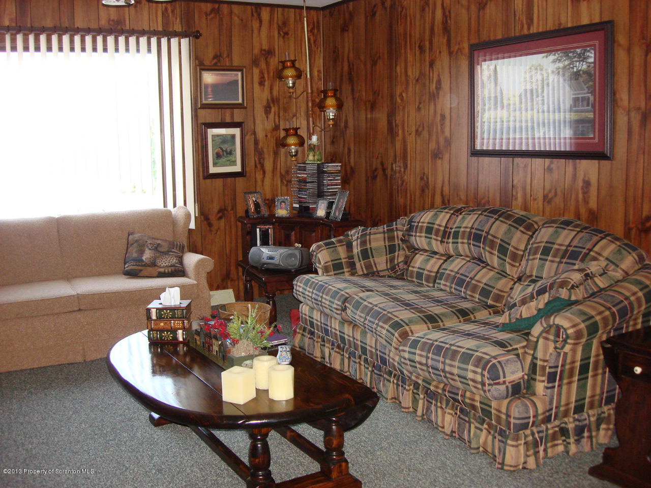 276 Lane Hill Road Tunkhannock, PA 18657 - Photo 3 of 13 a living room with furniture and a window