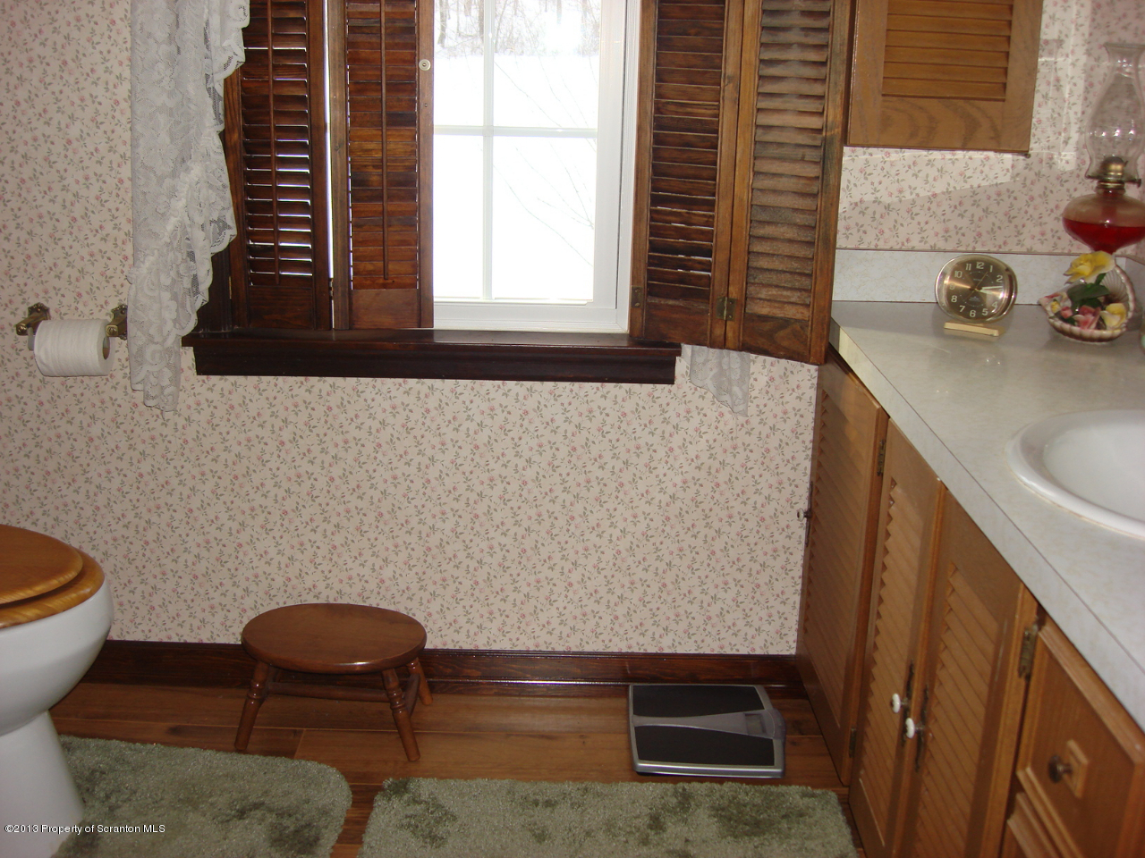 276 Lane Hill Road Tunkhannock, PA 18657 - Photo 10 of 13 a bathroom with a sink and a toilet