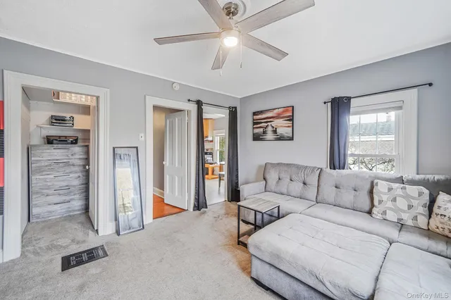 a living room with furniture and a couch
