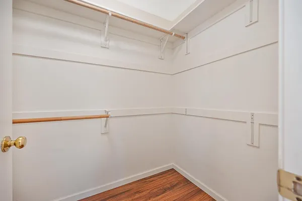 a view of a hallway with an entryway