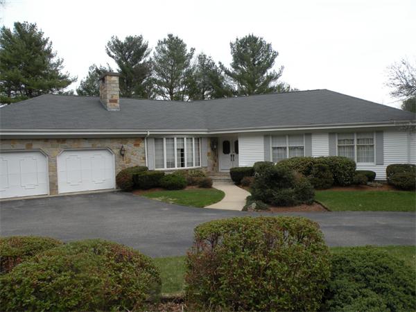 47 Algonquin Road Canton, MA 02021 - Photo 1 of 16 a front view of a house with garden