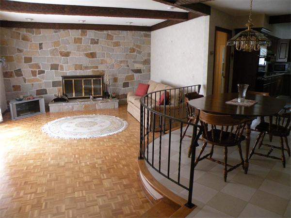 47 Algonquin Road Canton, MA 02021 - Photo 11 of 16 a view of a livingroom with furniture and fireplace