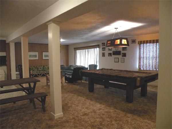 47 Algonquin Road Canton, MA 02021 - Photo 15 of 16 a room with furniture pool table and windows