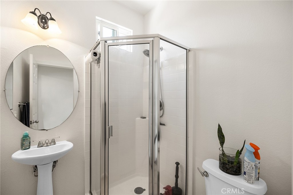 1427 Marble Canyon Way Chula Vista, CA 91915 - Photo 18 of 60 a bathroom with a sink and a mirror
