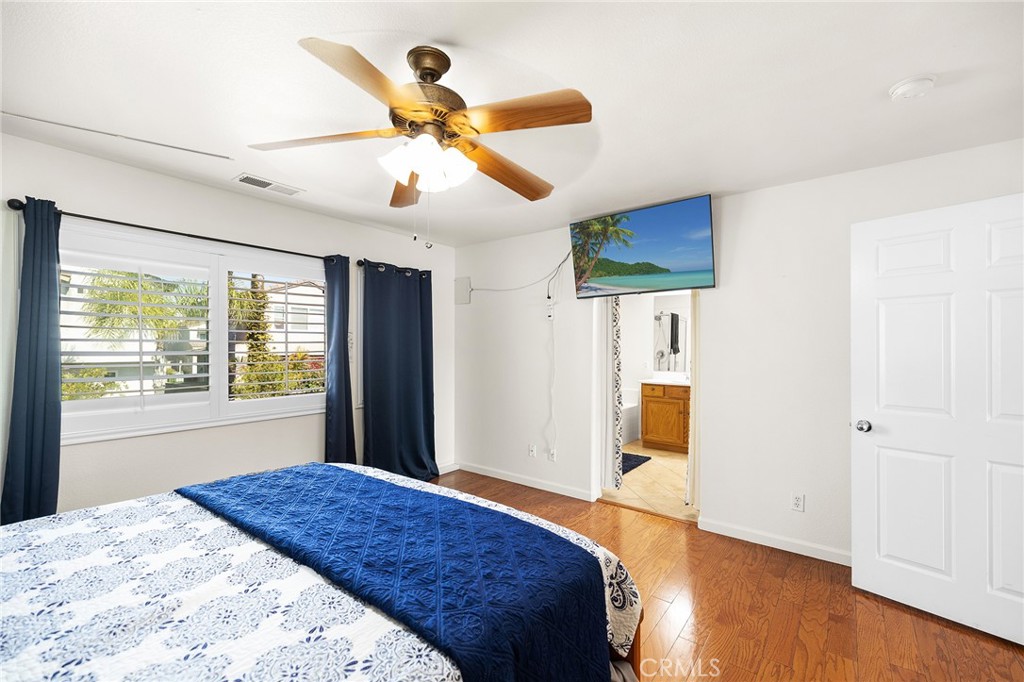 1427 Marble Canyon Way Chula Vista, CA 91915 - Photo 22 of 60 a bedroom with a bed and a window