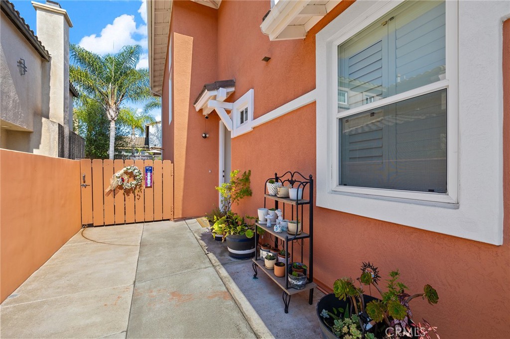 1427 Marble Canyon Way Chula Vista, CA 91915 - Photo 32 of 60 a front view of a house with a potted plant