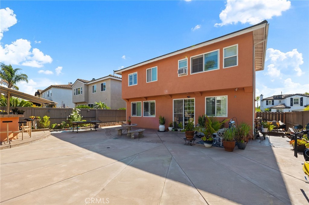 1427 Marble Canyon Way Chula Vista, CA 91915 - Photo 36 of 60 a front view of a building with sitting area