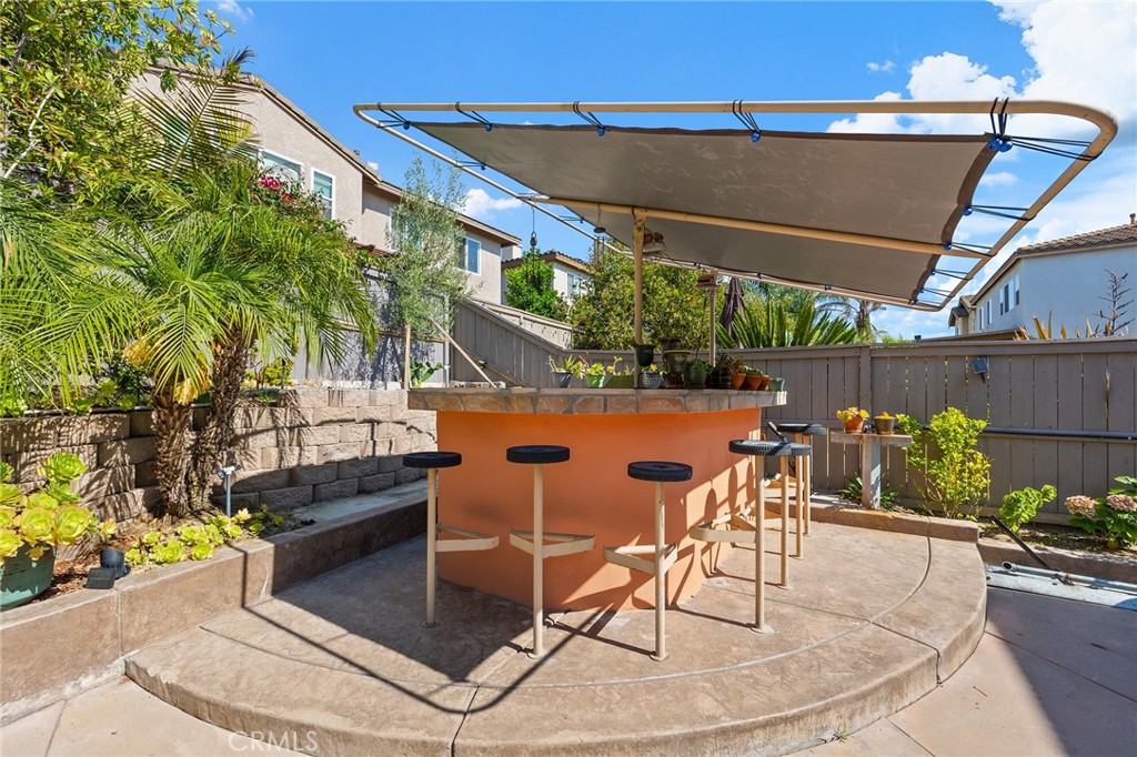 1427 Marble Canyon Way Chula Vista, CA 91915 - Photo 37 of 60 a patio with table and chairs