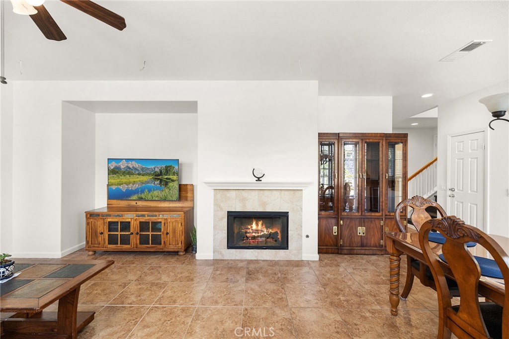 1427 Marble Canyon Way Chula Vista, CA 91915 - Photo 7 of 60 a living room with furniture and a fireplace