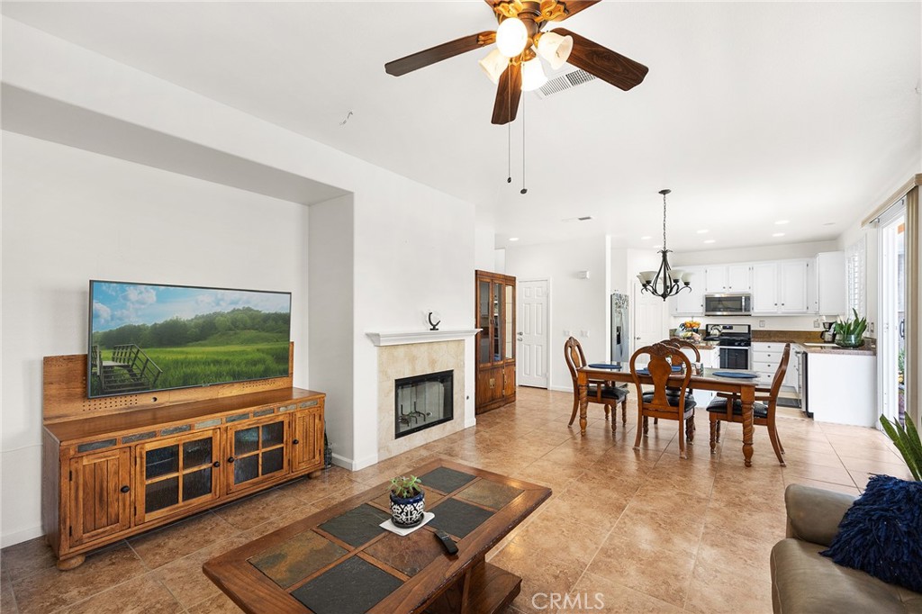 1427 Marble Canyon Way Chula Vista, CA 91915 - Photo 9 of 60 a living room with furniture and a flat screen tv