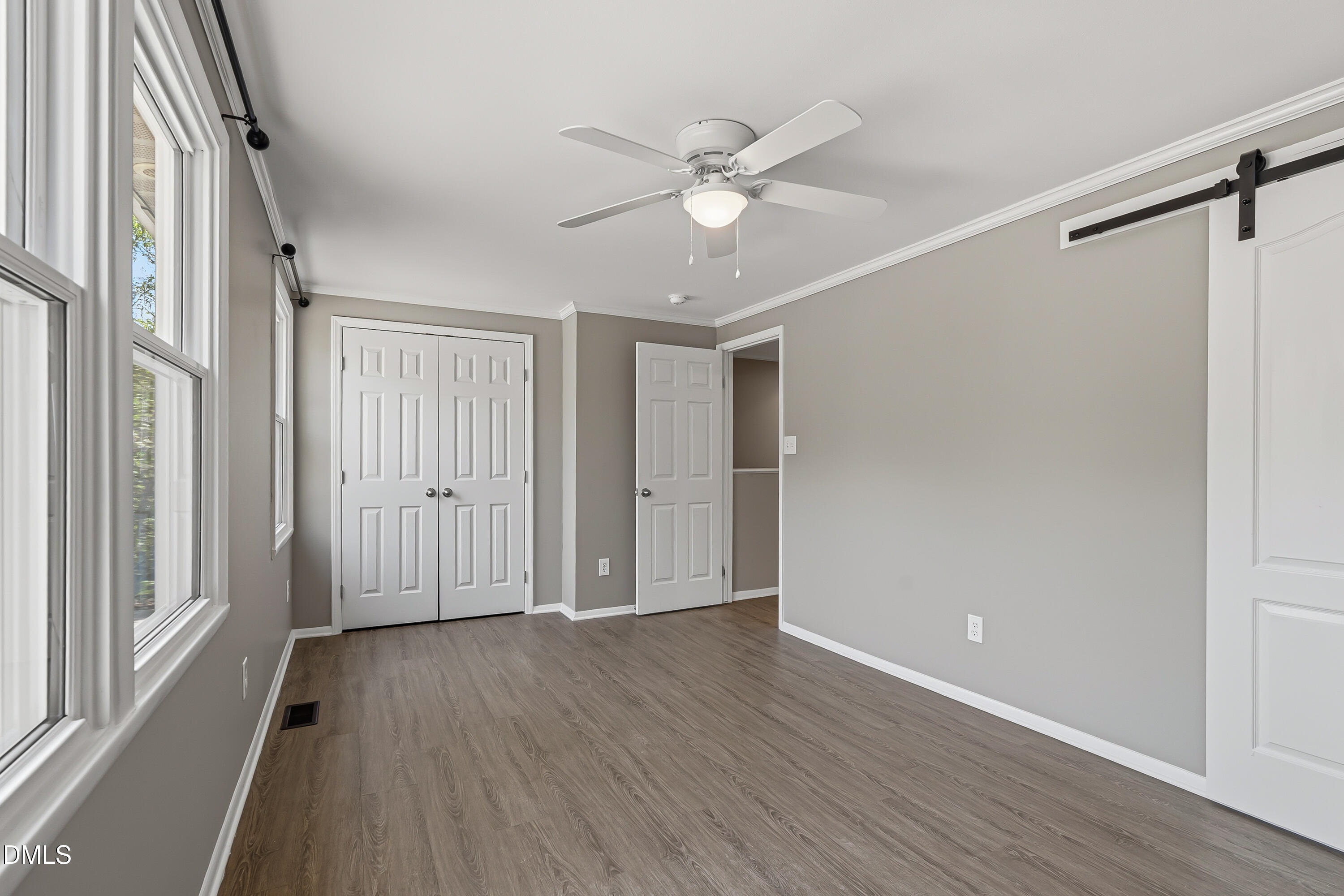 7715 Ohmann Court Raleigh, NC 27615 - Photo 23 of 36 Primary Bedroom