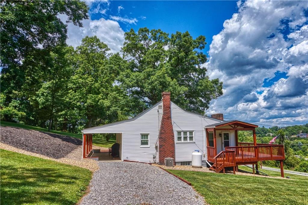 842 Pittsburgh Road Butler, PA 16002 - Photo 2 of 25 A covered rear porch and large front deck (with amazing views) offer great space to relax or entertaining!