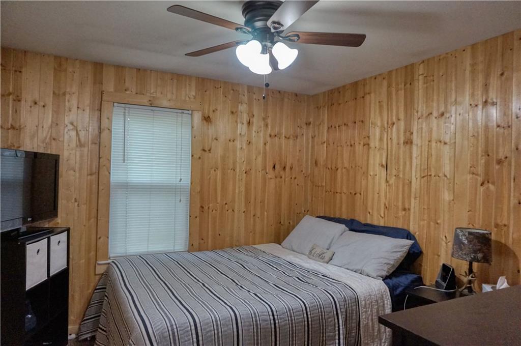 842 Pittsburgh Road Butler, PA 16002 - Photo 19 of 25 Master bedroom with knotty pine wood walls!