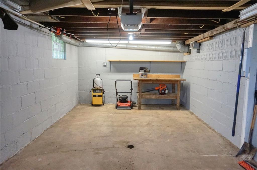 842 Pittsburgh Road Butler, PA 16002 - Photo 23 of 25 1 stall integral garage with door opener, glass block windows throughout the basement!