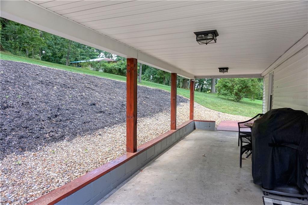 842 Pittsburgh Road Butler, PA 16002 - Photo 7 of 25 Covered porch with new beams and soffit!