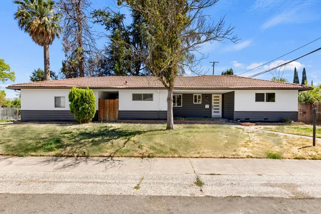 a view of a house with a swimming pool