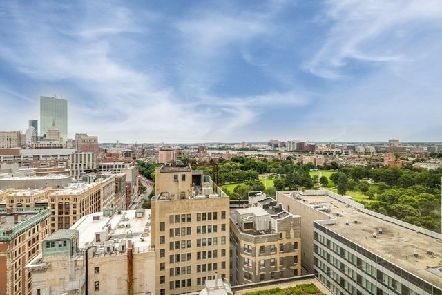 a view of a city with tall buildings