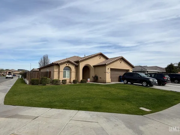 a house view with a garden space