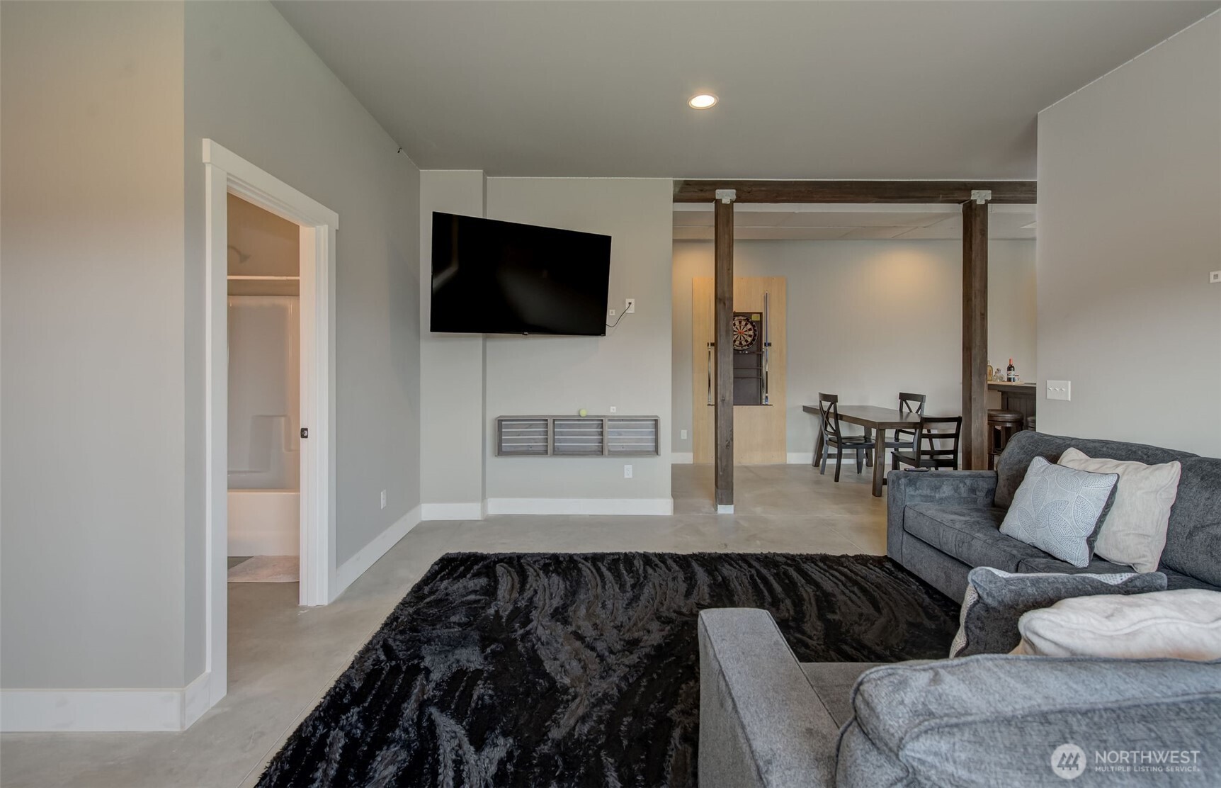 1900 Cumbo Court Wenatchee, WA 98801 - Photo 13 of 33 a living room with furniture and a flat screen tv