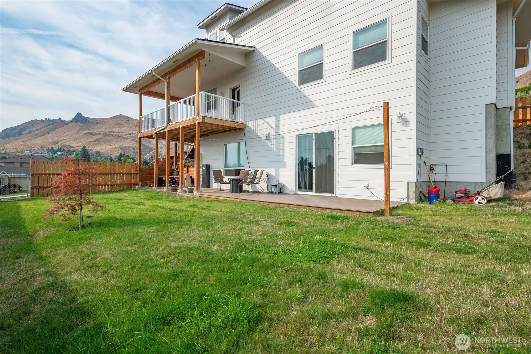 1900 Cumbo Court Wenatchee, WA 98801 - Photo 2 of 33 a view of a house with a backyard and porch