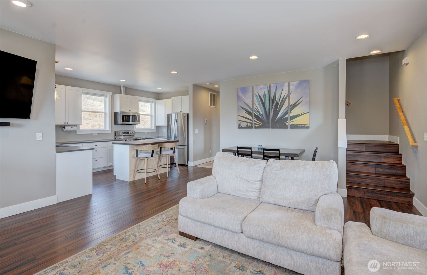 1900 Cumbo Court Wenatchee, WA 98801 - Photo 3 of 33 a living room with furniture and a flat screen tv