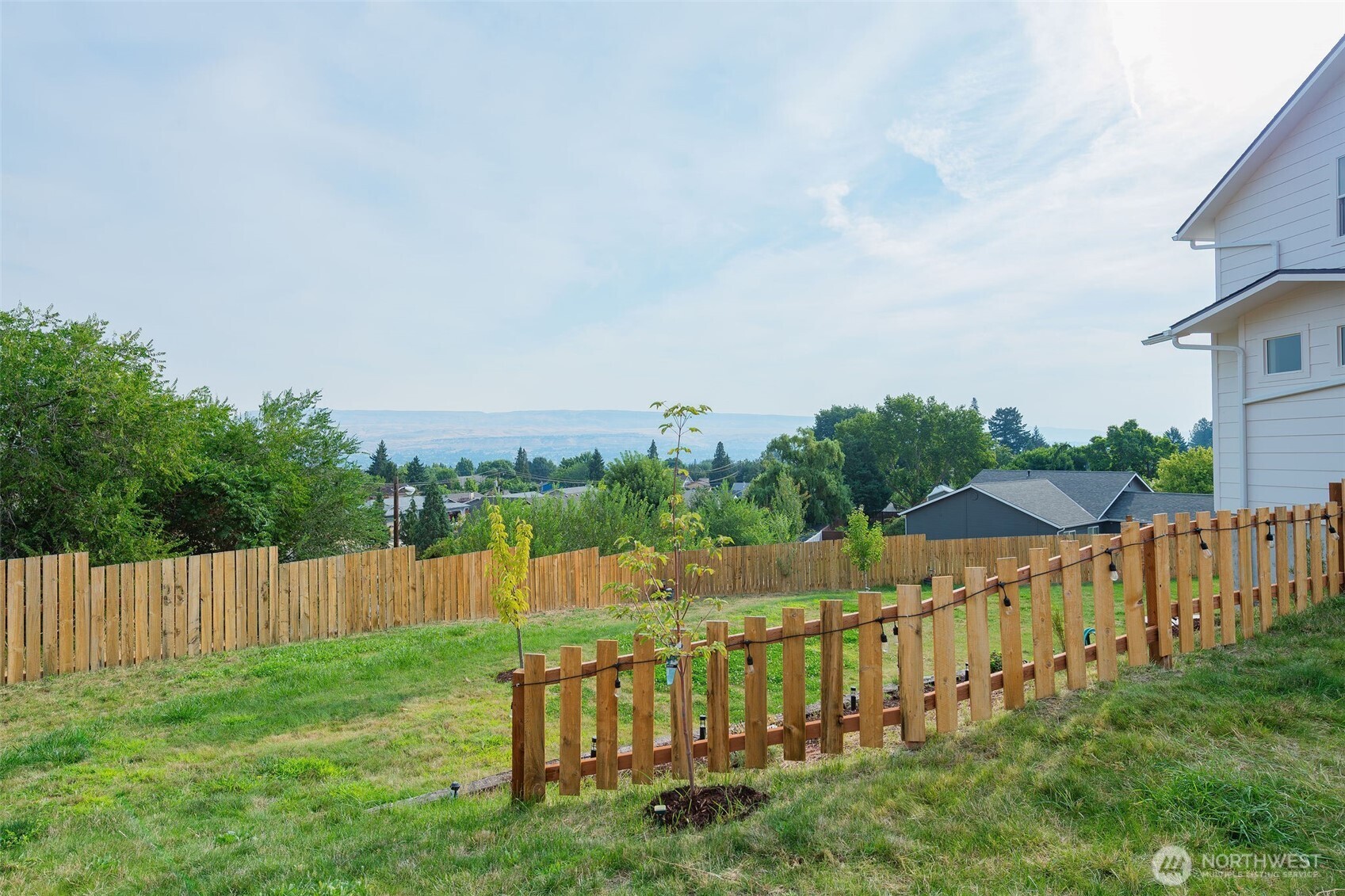 1900 Cumbo Court Wenatchee, WA 98801 - Photo 32 of 33 a view of an house with backyard space and garden