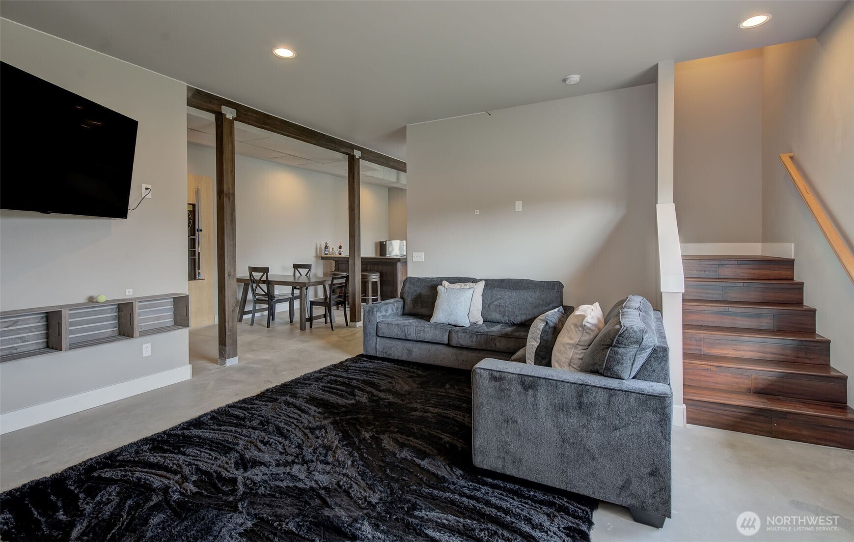 1900 Cumbo Court Wenatchee, WA 98801 - Photo 10 of 33 a living room with furniture and a flat screen tv