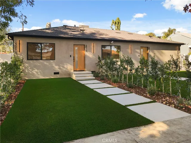 a view of a porch with a yard