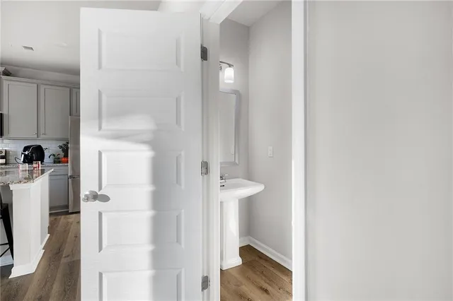 a bathroom with a sink and mirror