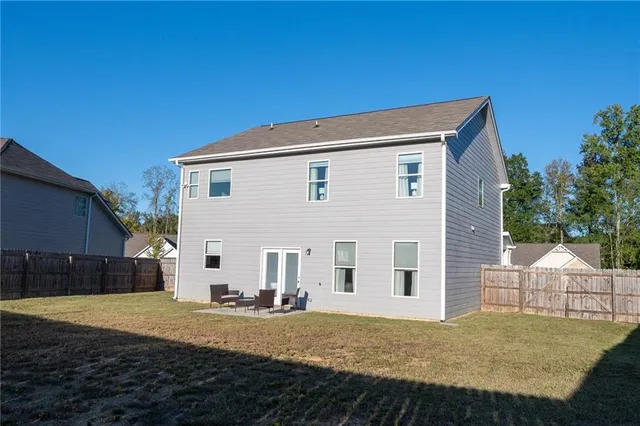 a view of a park with swings and slides