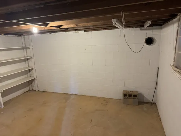 a view of a room with racks on the wall