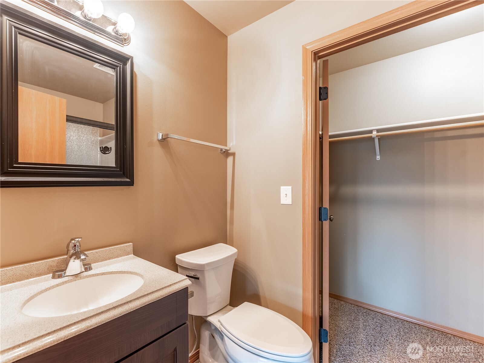 1535 Historic Lane Wenatchee, WA 98801 - Photo 13 of 35 a bathroom with a toilet a sink and mirror