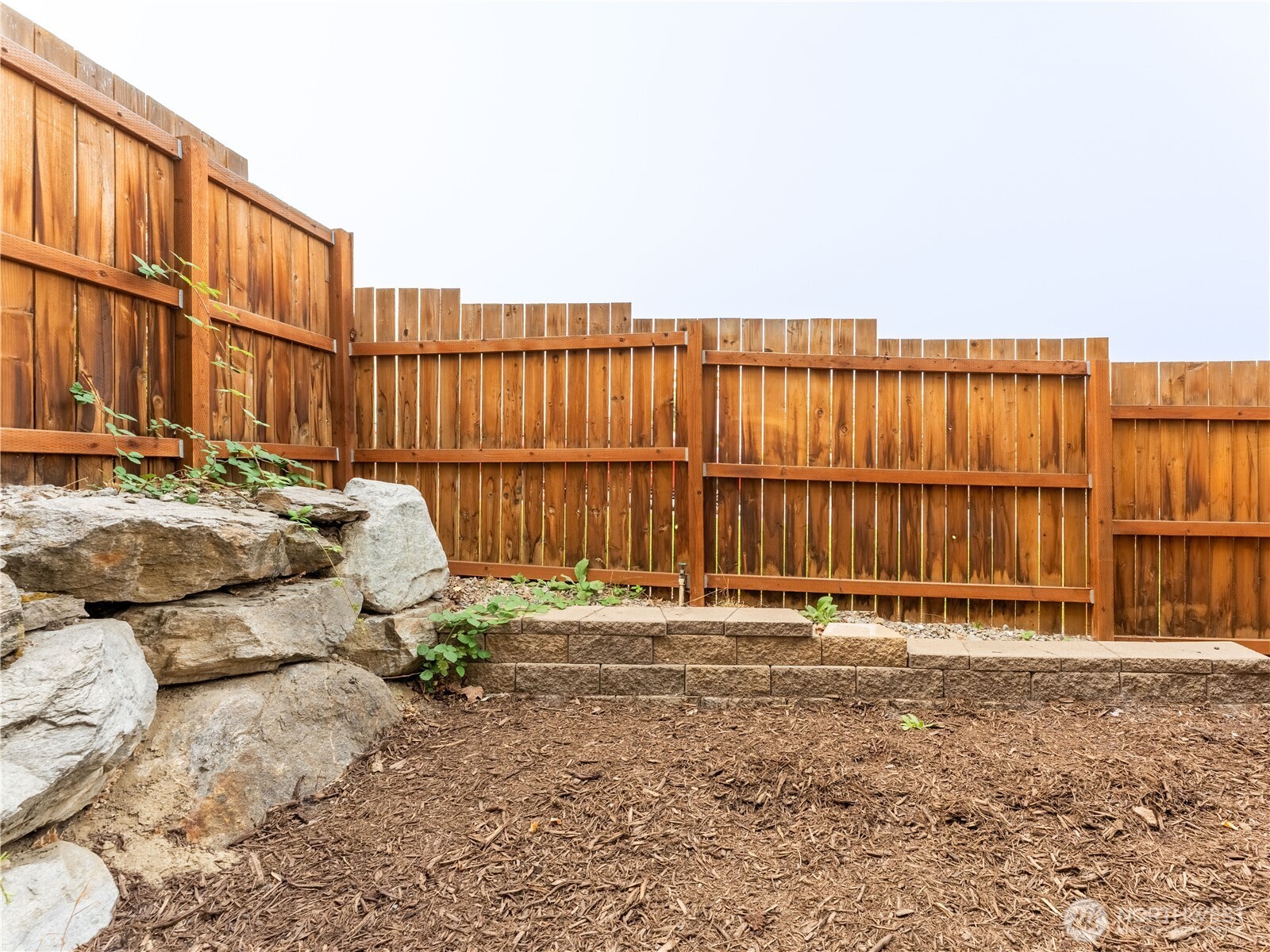 1535 Historic Lane Wenatchee, WA 98801 - Photo 34 of 35 a backyard of a house with large trees