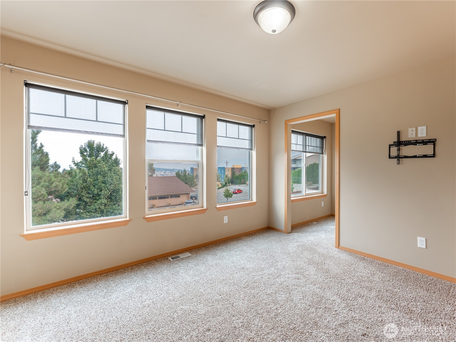 1535 Historic Lane Wenatchee, WA 98801 - Photo 4 of 35 an empty room with windows and view