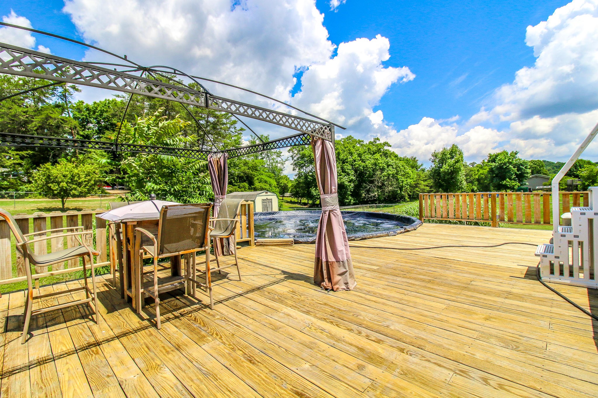 1973 Phagan Road Talbott, TN 37877 - Photo 28 of 35 a view of a patio with a table and chairs