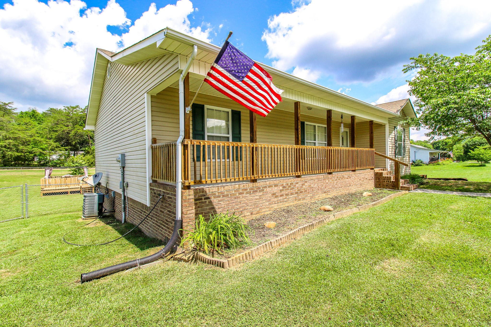 1973 Phagan Road Talbott, TN 37877 - Photo 3 of 35 a front view of a house with a yard