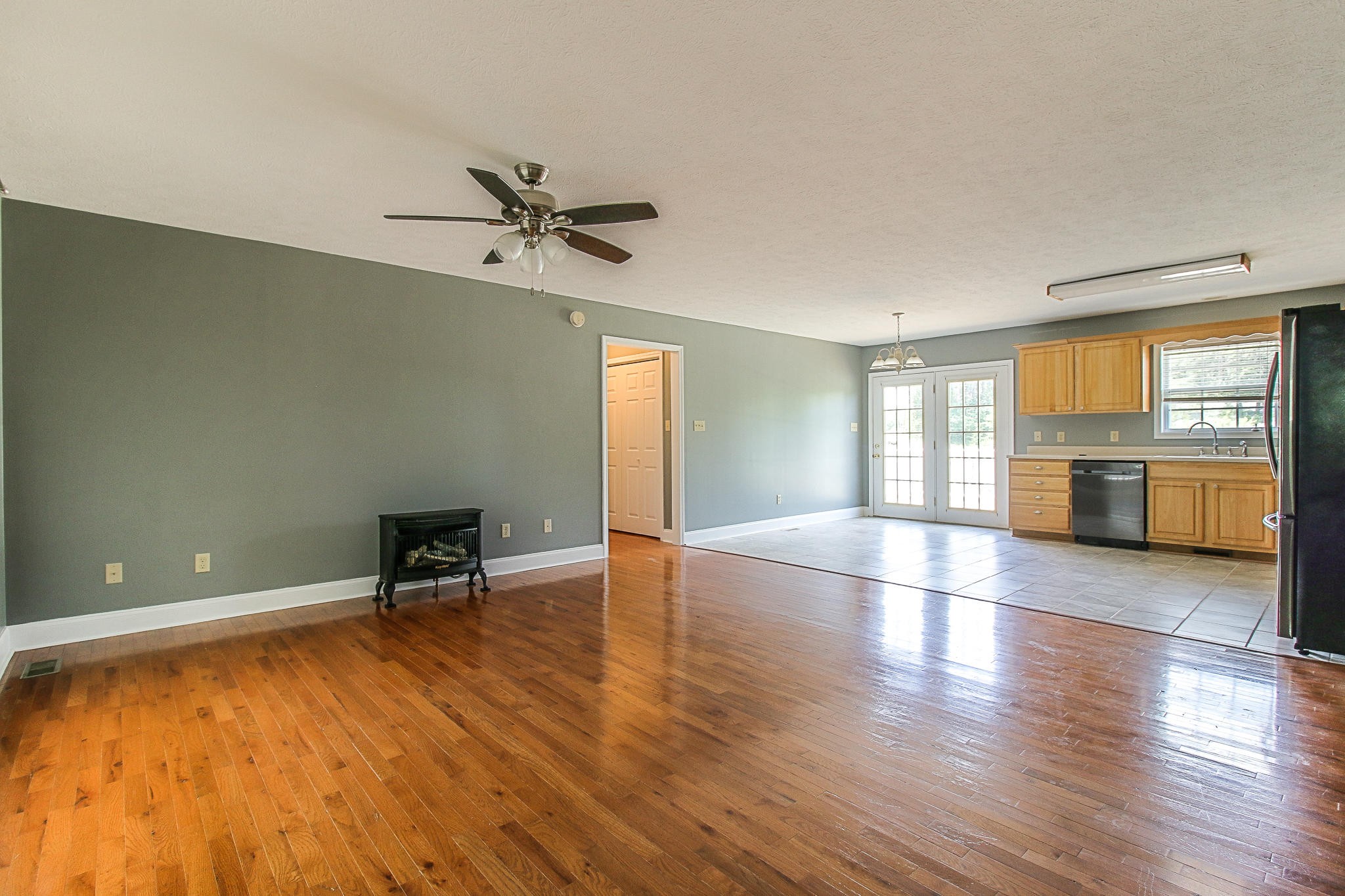 1973 Phagan Road Talbott, TN 37877 - Photo 5 of 35 an empty room with wooden floor and windows