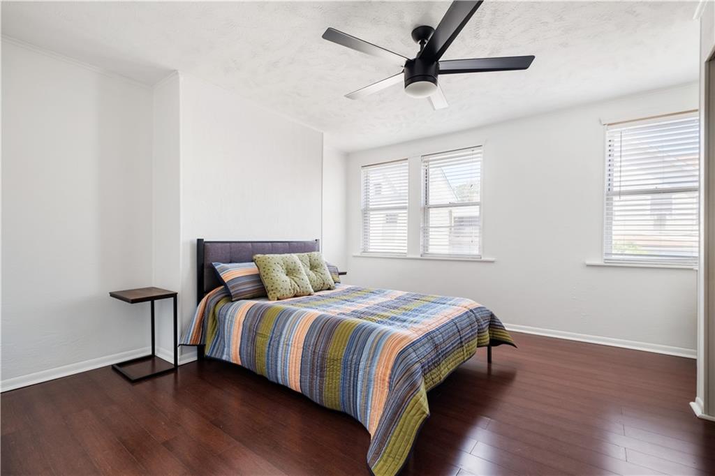 4088 Howley Street Pittsburgh, PA 15224 - Photo 18 of 32 a bedroom with bed and window