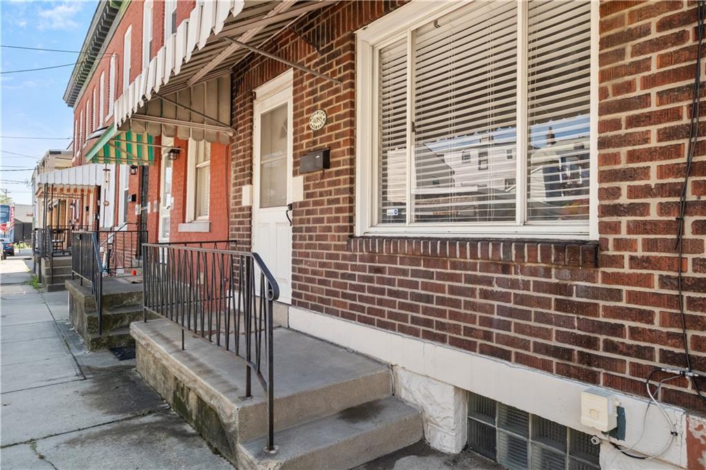 4088 Howley Street Pittsburgh, PA 15224 - Photo 2 of 32 a view of a brick building with many windows